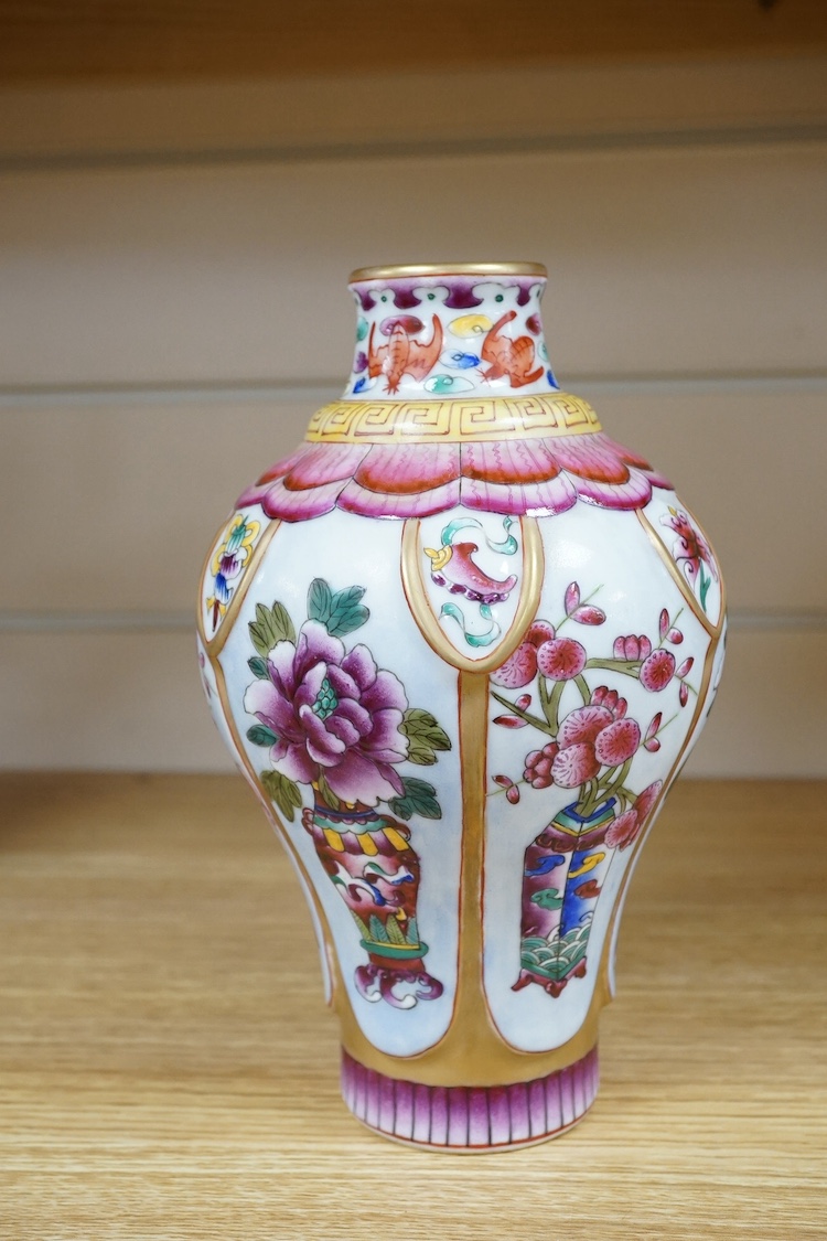 A Chinese famille rose vase enamelled with flowers, 20cm high. Condition - good